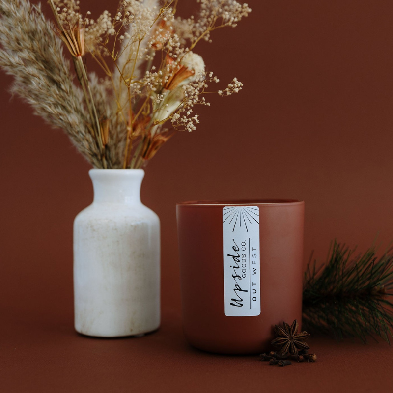 Terracotta Clay Signature color glass in a 12oz matte vessel featuring Out West new Fall 2025 scent 