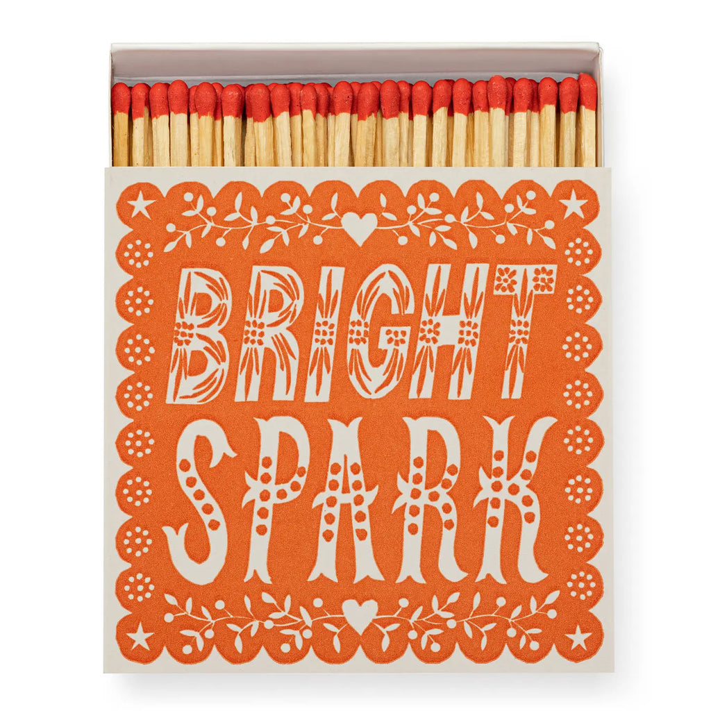 Matches in a decorative box with 'Bright Spark' text on an orange background