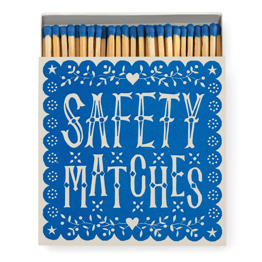 Box of safety matches with decorative blue and white design
