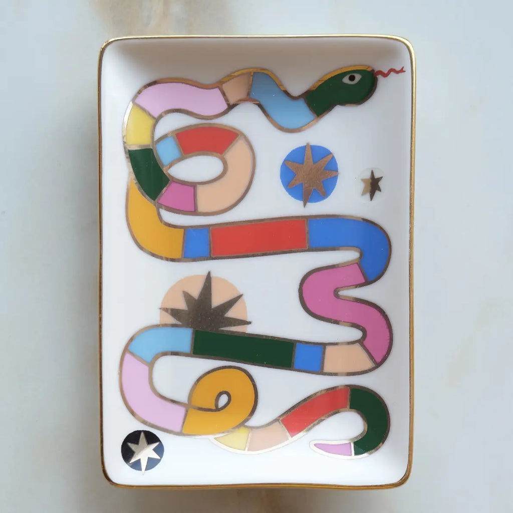 Decorative tray with a colorful snake design on a white background